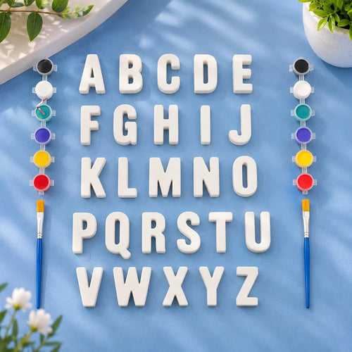 ABC Alphabet Set — 26 white Plaster of Paris letters with paint pots and brushes on light blue background