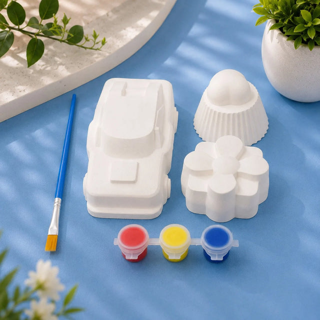 Car, Cupcake & Flower Set — white Plaster of Paris figures with paint pots and brush on light blue background