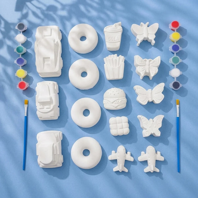 Mega Mix Plaster of Paris painting set — 16 figures with 2 paint strips and 2 brushes on light blue background