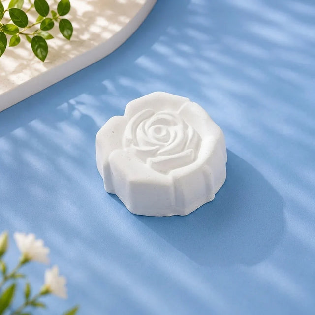 Rose flower medium ready-to-paint plaster figure on blue background