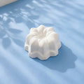 Sunflower ready-to-paint plaster figure on blue background